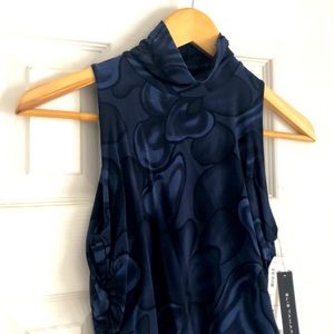 Sleeveless shirred blouse.